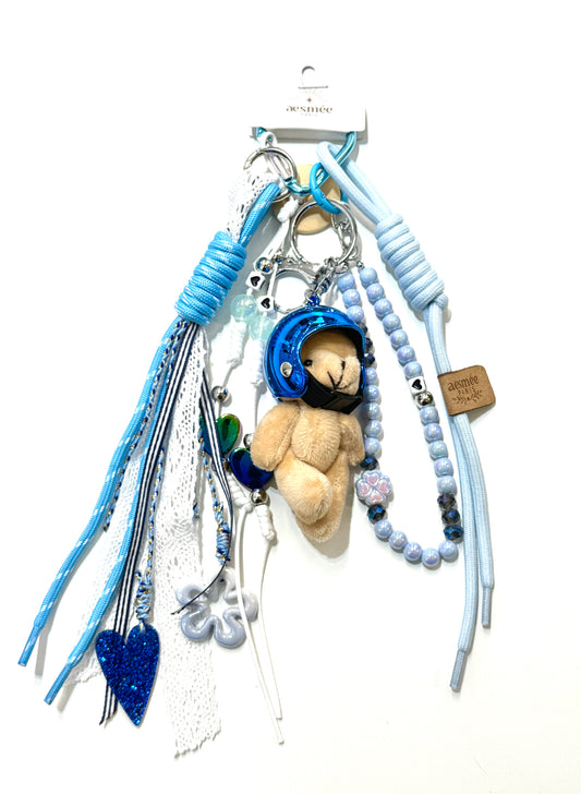 PORTE CLÉ SAC GRIGRI - COLLECTION VIVA COLOR "Nounours à casque"